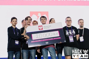 HackYeah on stage with a prize